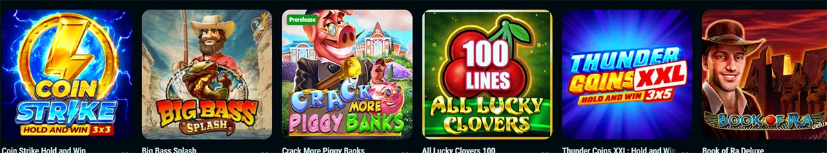 Row of popular casino slot games including Coin Strike Hold and Win, Big Bass Splash with a fisherman, Crack More Piggy Banks featuring a cartoon pig, All Lucky Clovers with 100 lines, Thunder Coins XXL Hold and Win, and Book of Ra Deluxe with an explorer character.